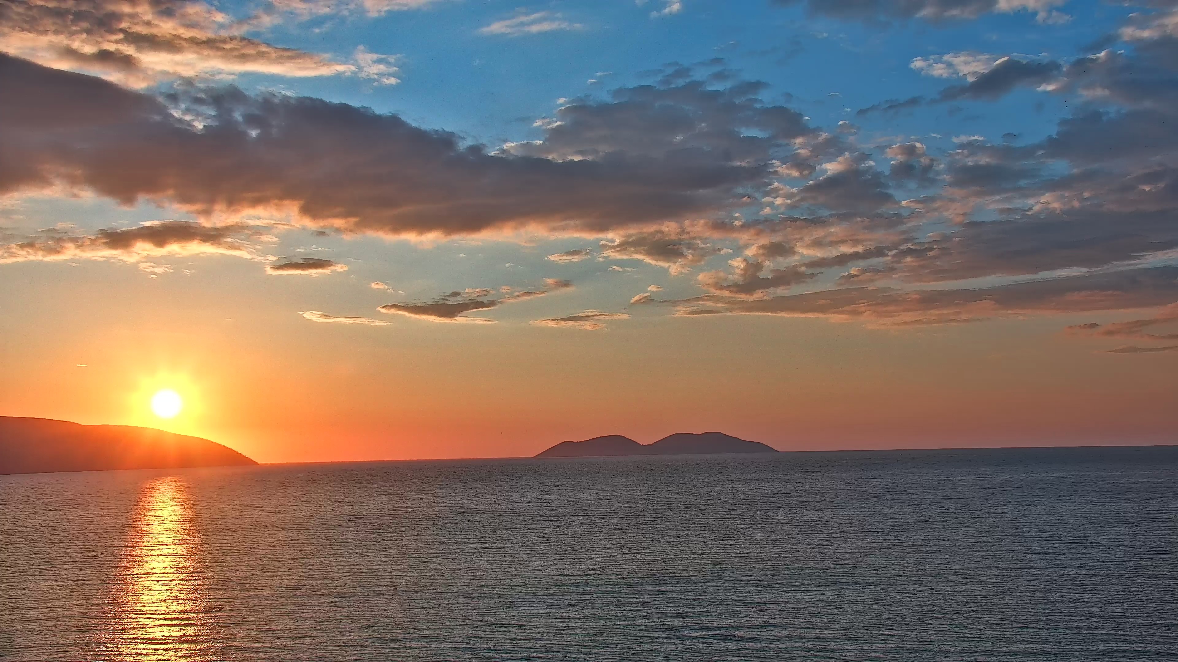 Sunset over Sazan Island captured by Vlora Bay Livecam